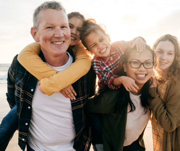 a family at a beach.